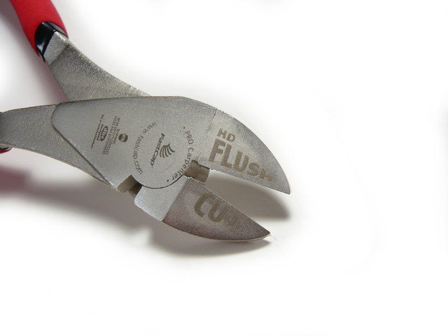 FastCap Heavy Duty Flush Cut Trimmers in use on a wooden surface