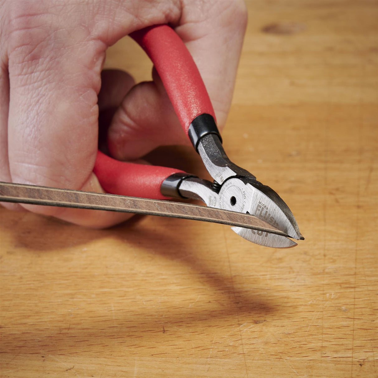 FastCap Micro Flush Cut Trimmers in action, precision cutting in tight spaces