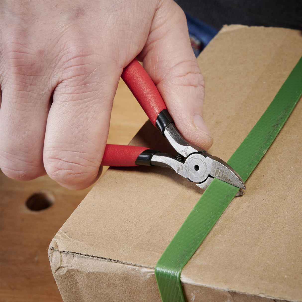 FastCap Micro Flush Cut Trimmers in action, effortlessly removing brad nails in tight corners