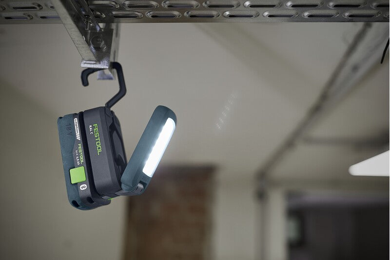 Portable Festool SYSLITE KAL C Cordless Working Light showing bright, even illumination in compact size