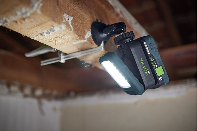 Compact yet powerful Festool SYSLITE KAL C cordless working light illuminating narrow workspaces effectively