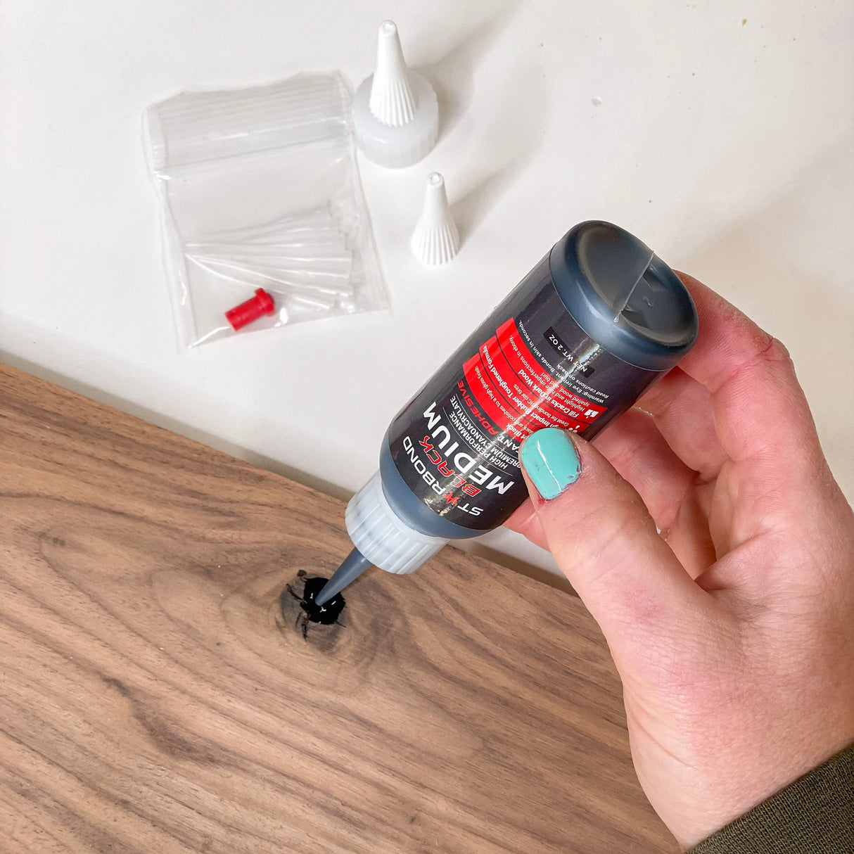 Starbond Black Medium CA Super Glue, ideal for dark finishes & bold accents. Rubber-toughened adhesive with flexibility and impact resistance