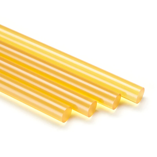 Power Adhesives Knottec Wood Knot Filler Glue Sticks 12mm Amber Hot Glue Pack of 5 in use on wooden surface