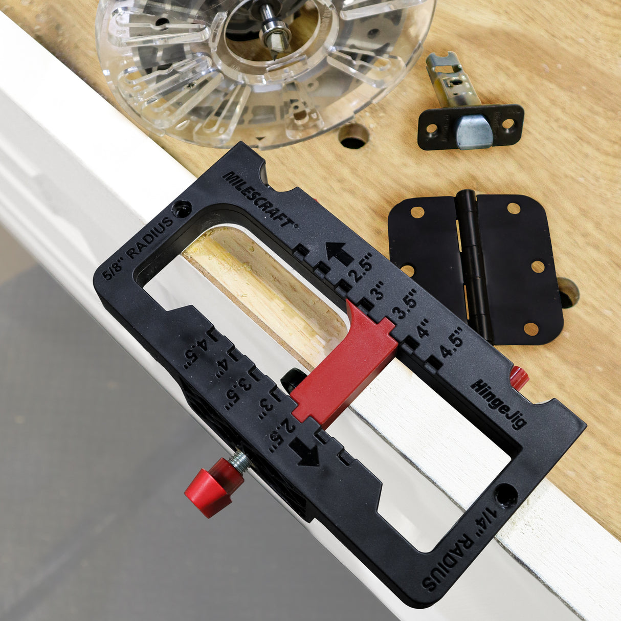Milescraft HingeJig self-clamping door hinge & latch router jig in use with timber door