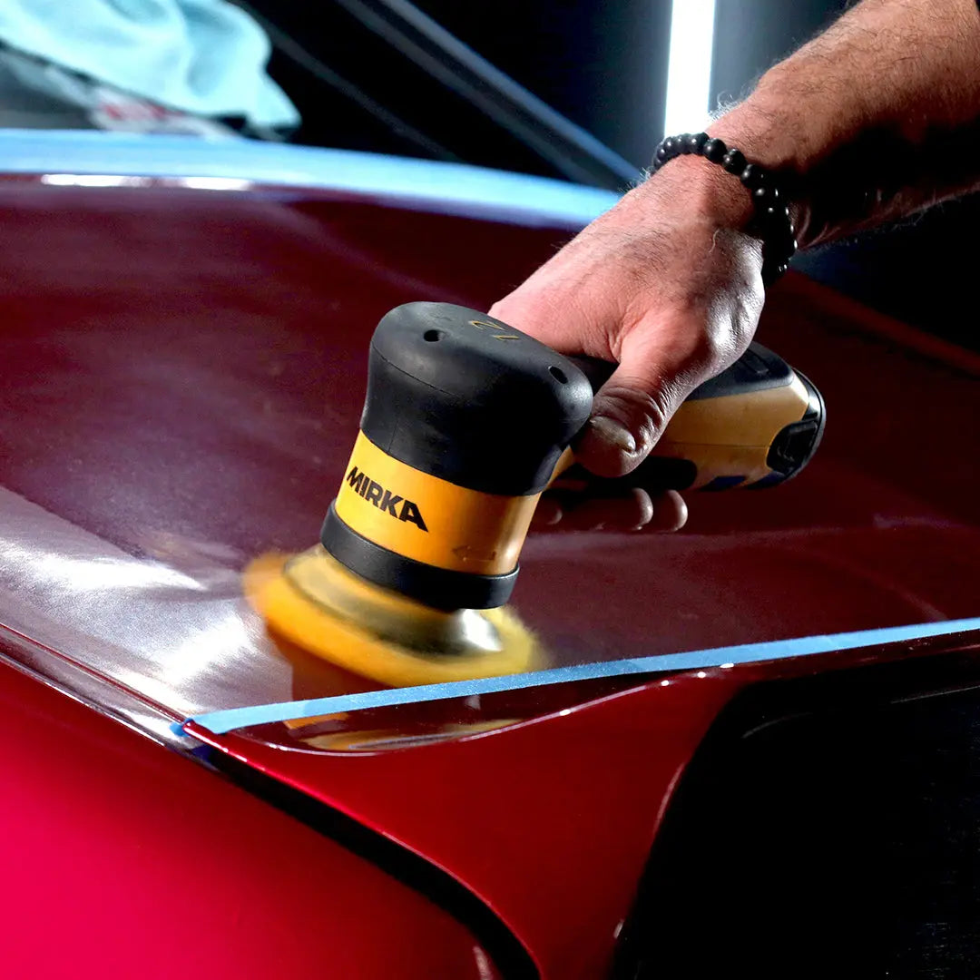 Mirka AROP-B Cordless Polisher 77mm 12.0mm Orbit 312NV in action smoothing out wood surface