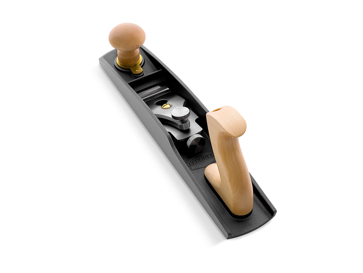 Melbourne Tool Company Low Angle Jack Hand Plane in action, showcasing precision craftsmanship and smooth wood finishing