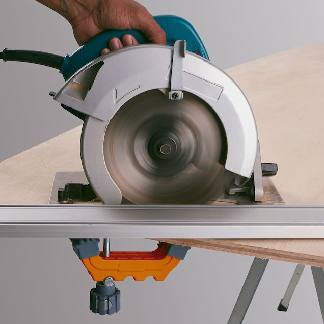 BORA NGX Track Clamp Pair attached to woodworking saw guide