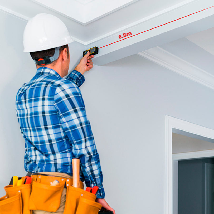 Prexiso Laser Measure P-60-L in workshop setting with horizontal bubble level