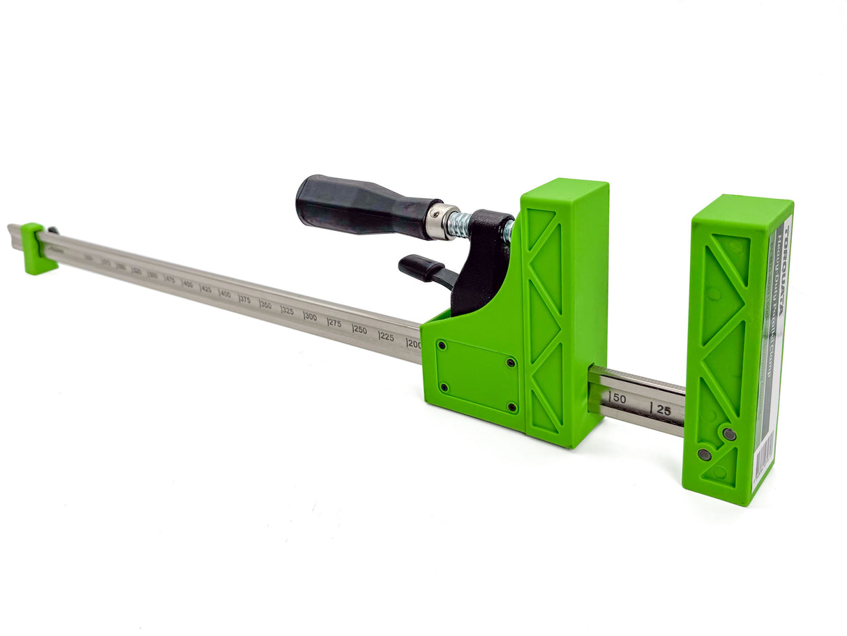 Torquata Heavy-Duty Parallel Clamp 1250mm in use on wooden panel