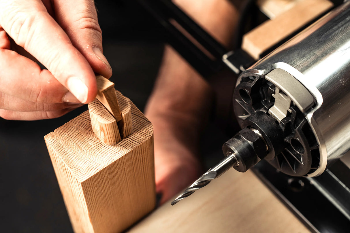 11 Degree Tapered Ball Nose CNC Router Bit 1/4in Shank in use for precise woodworking tasks