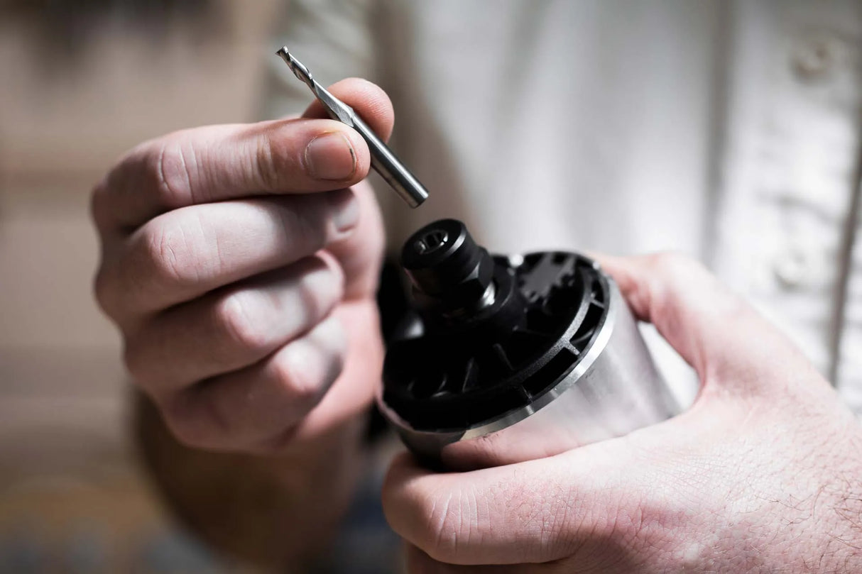 1/8in x 1/2in Up-Spiral Flat CNC Router Bit in action, ideal for fine detail woodworking with solid carbide composition
