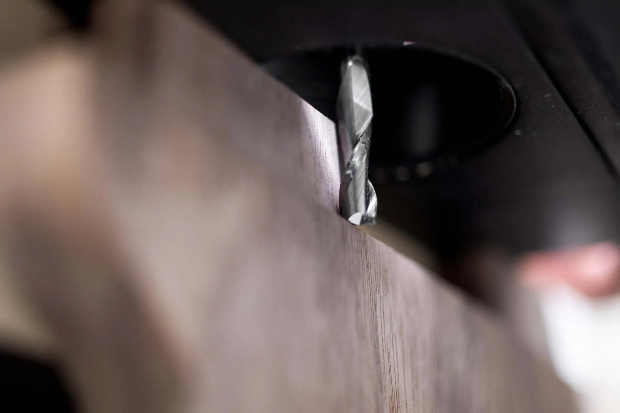 Australian-made 1/4in x 3/4in Up-Spiral Flat CNC Router Bit 1/4in Shank in action on hardwood, with two-flute upcut design for efficient chip removal