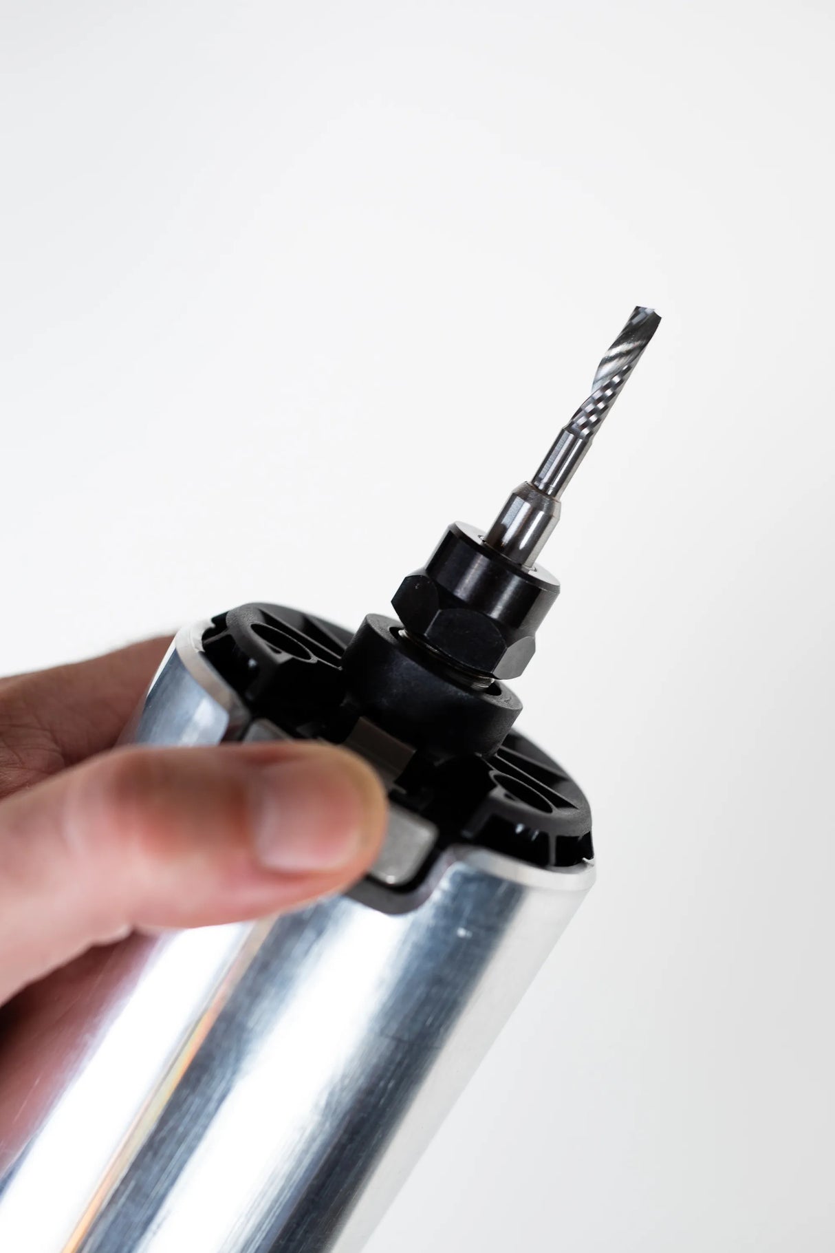 5mm x 20mm Up-Spiral O-Flute CNC Router Bit 8mm Shank in action, cutting through dense hardwood with precision