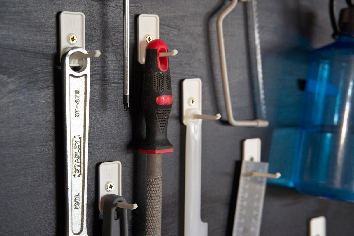 Three white Superhooks Nimble Hooks with 5kg capacity displayed against a white background