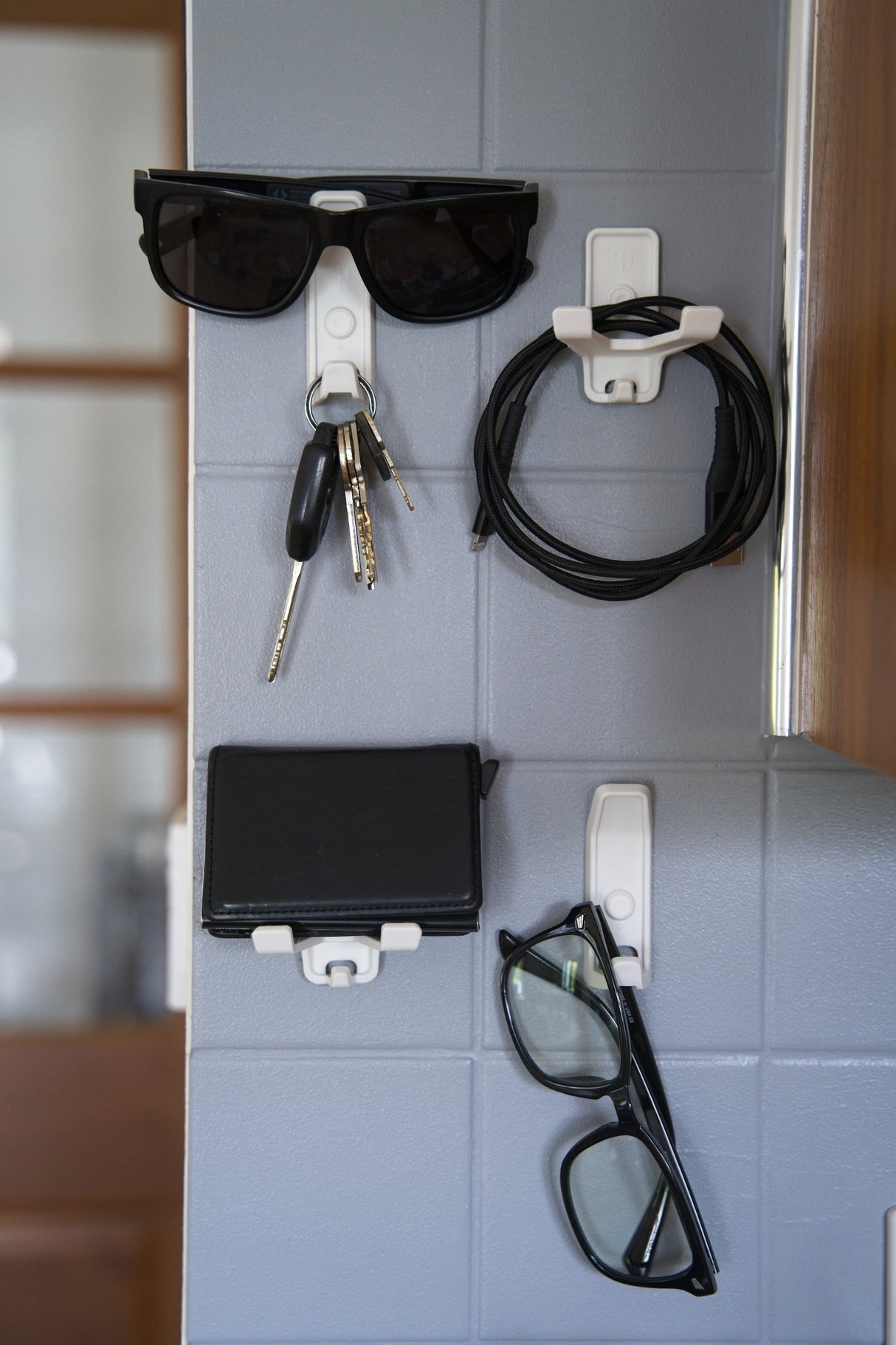 Superhooks Multi Hook White 3 Pack 5kg Capacity angled view showing reinforced double arm hook and small securing hook