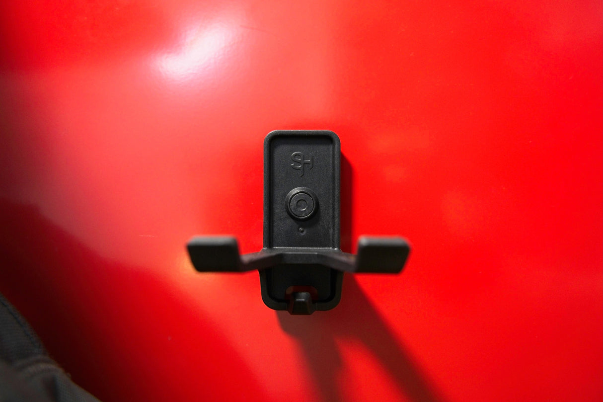 Versatile black Superhooks multi hook with double arm and small securing hook. Sturdy wall-mounted design