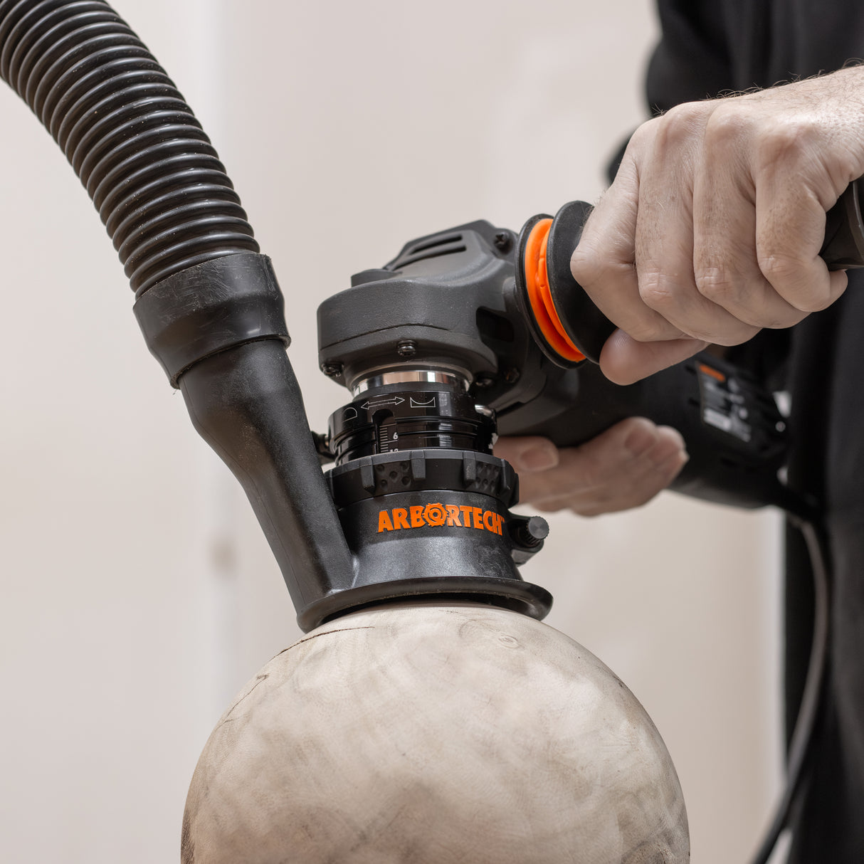 Arbortech SpheroPlane angle grinder attachment carving spherical wooden bowl with adjustable radius