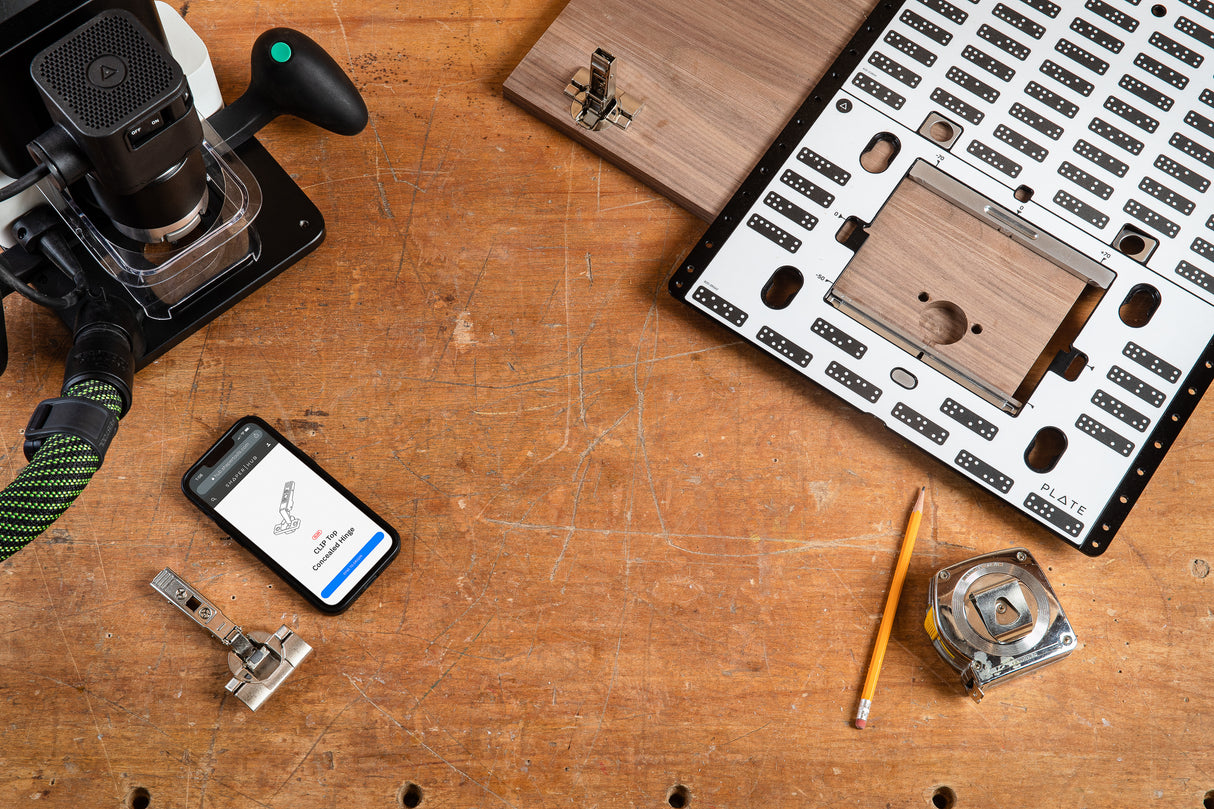 Shaper Plate Bundle lifestyle image showcasing handheld CNC router and universal template in action