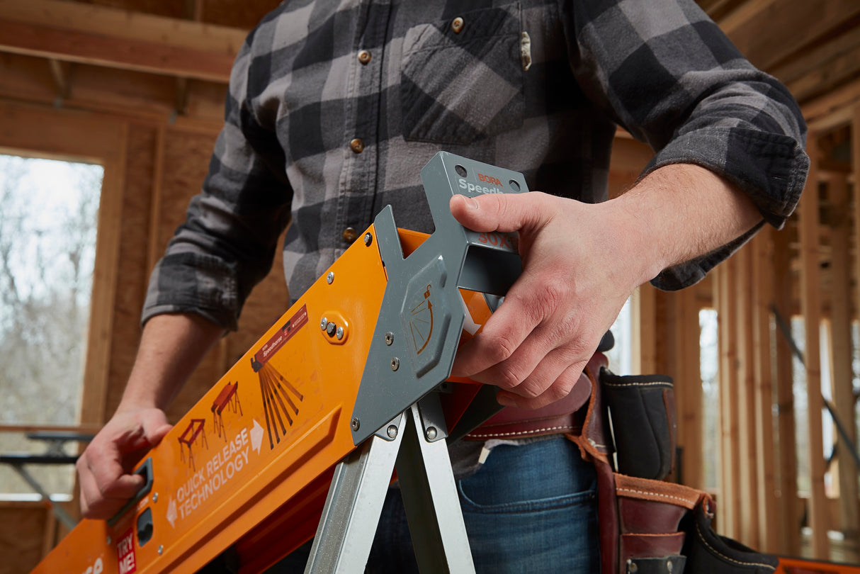 Two BORA Speedhorse sawhorses folded for easy transport on the job site