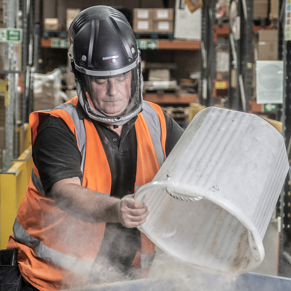 Trend Airshield Pro Respirator Face Shield Dust Mask Set in action, circulating air for woodworking protection