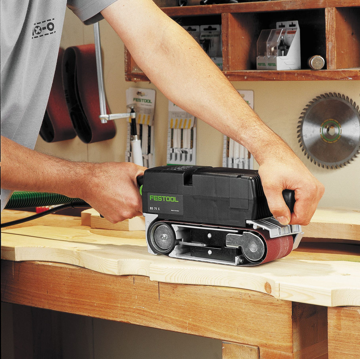 Festool BS 75mm Belt Sander with Sanding Frame Set in use on wood surface, achieving precise sanding parallel to the grain