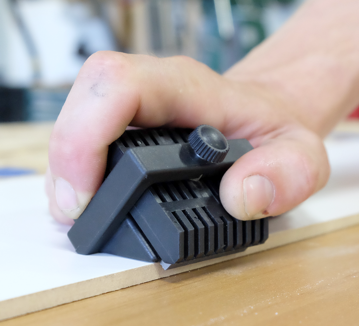 FastCap Edge Break File for Melamine & Timber Edging, angled view with adjustable depth for wood edge finishing