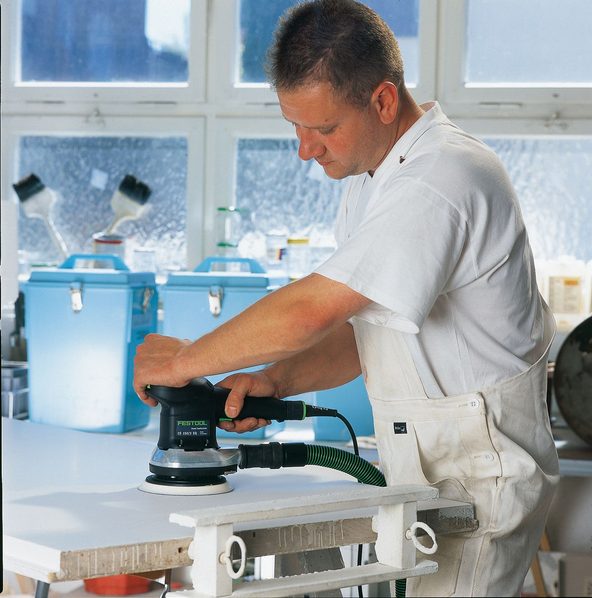 Festool ETS 150/3 Sander in use on timber surface, showcasing fine sanding capabilities