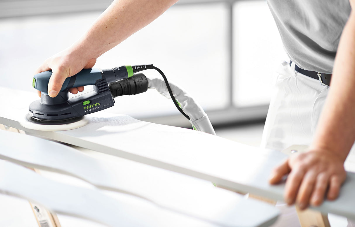 Festool ETS 150/5 sander in action on a wooden surface