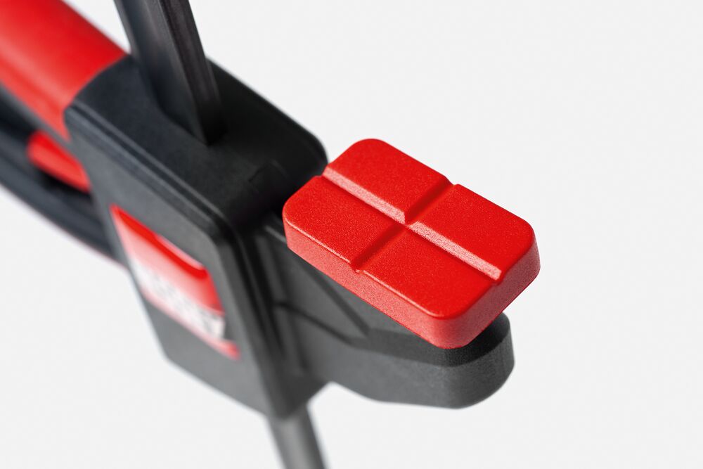 Bessey 150mm One-Handed Table Clamps in use on workbench with woodworking tools