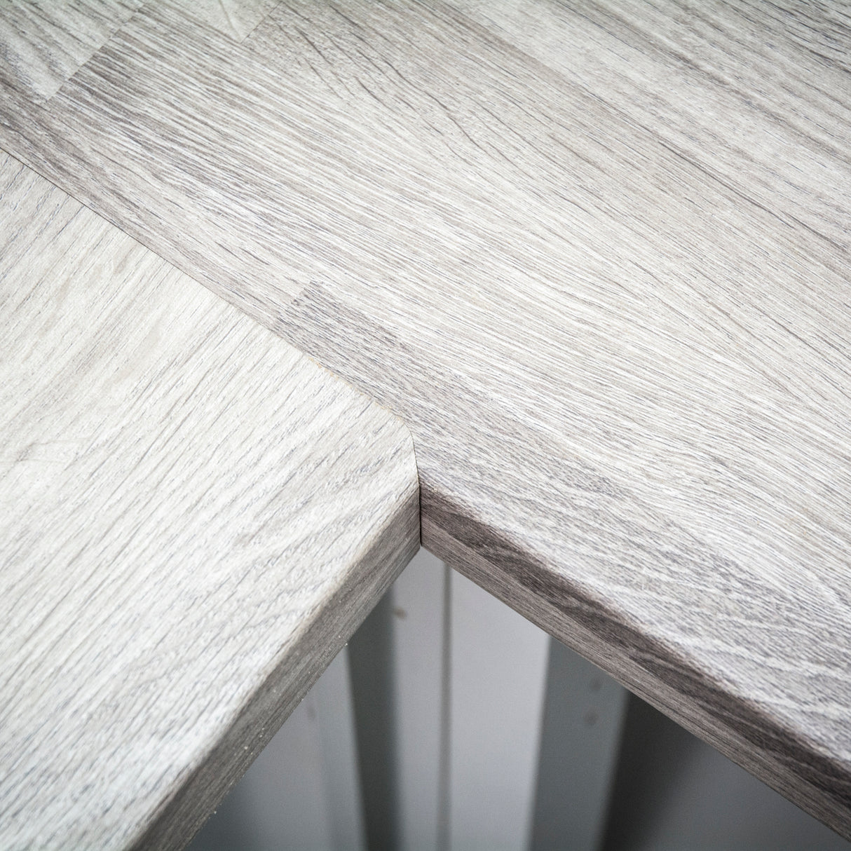 Trend 950mm Professional Kitchen Worktop Router Jig showcasing mitre joint routing capability on laminate surfaces