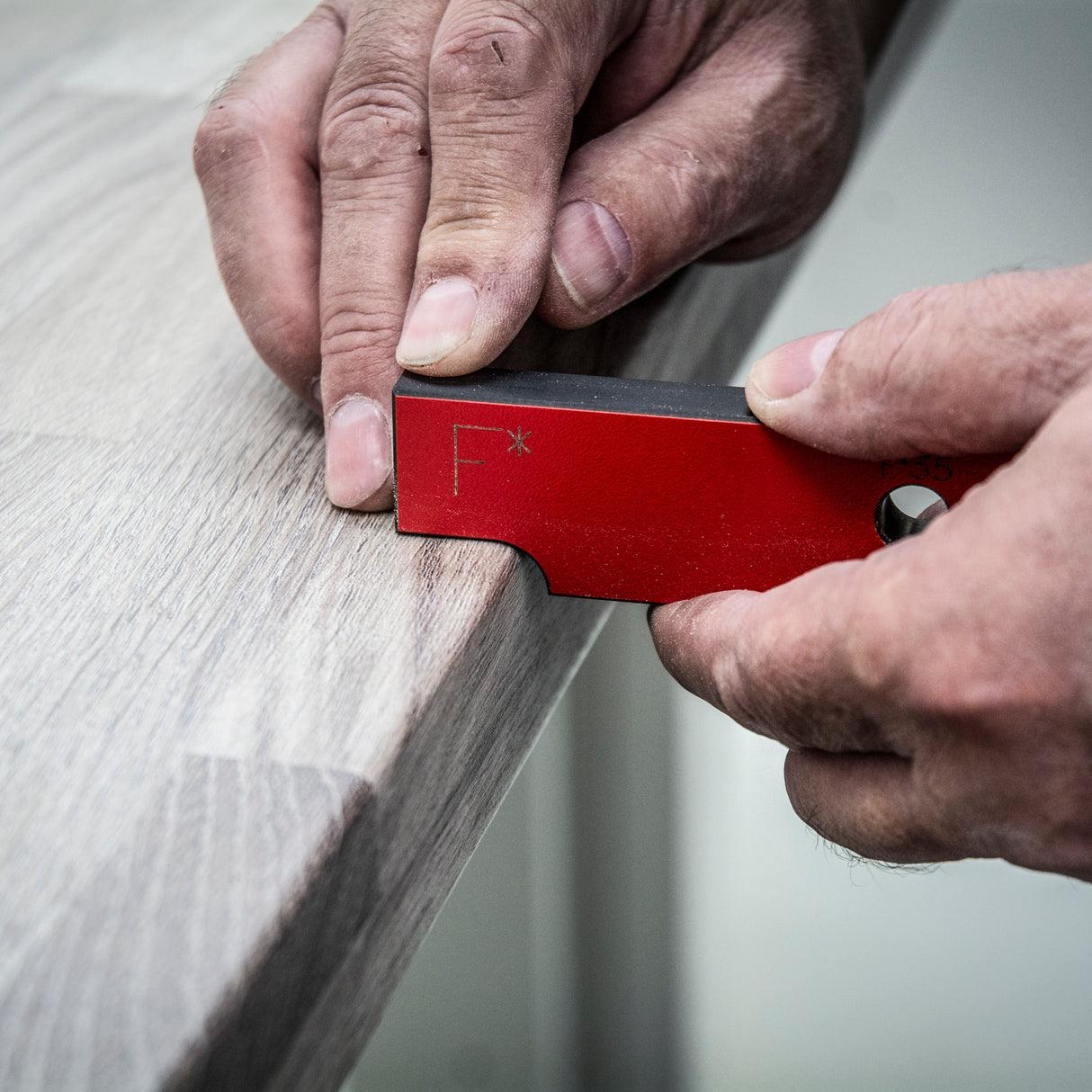 Trend 950mm Professional Kitchen Worktop Router Jig in use with laminate surface, showcasing precise routing capabilities