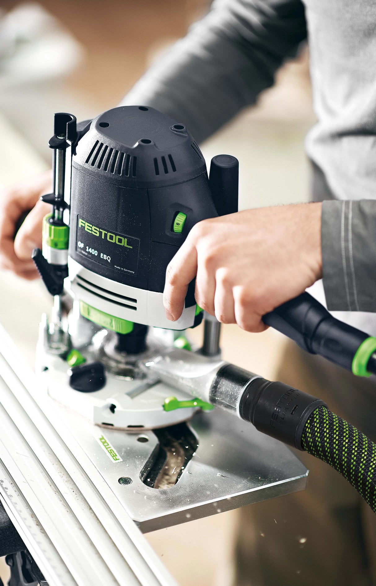 Festool OF 1400 70mm Plunge Router in Systainer, demonstrating precision routing with templates
