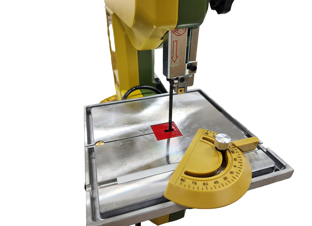 PROXXON MBS-240/E 6.5in Micro Bandsaw cutting wood at an angle