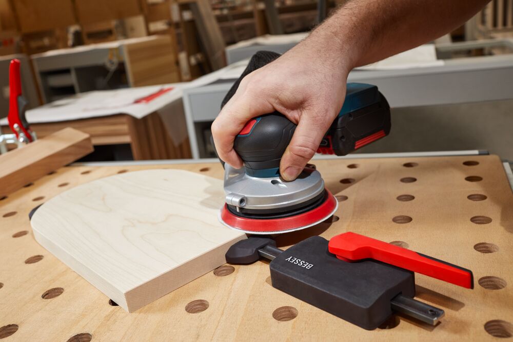 Bessey Horizontal Fixture Clamps in use on wooden workbench - Australian woodworking tools