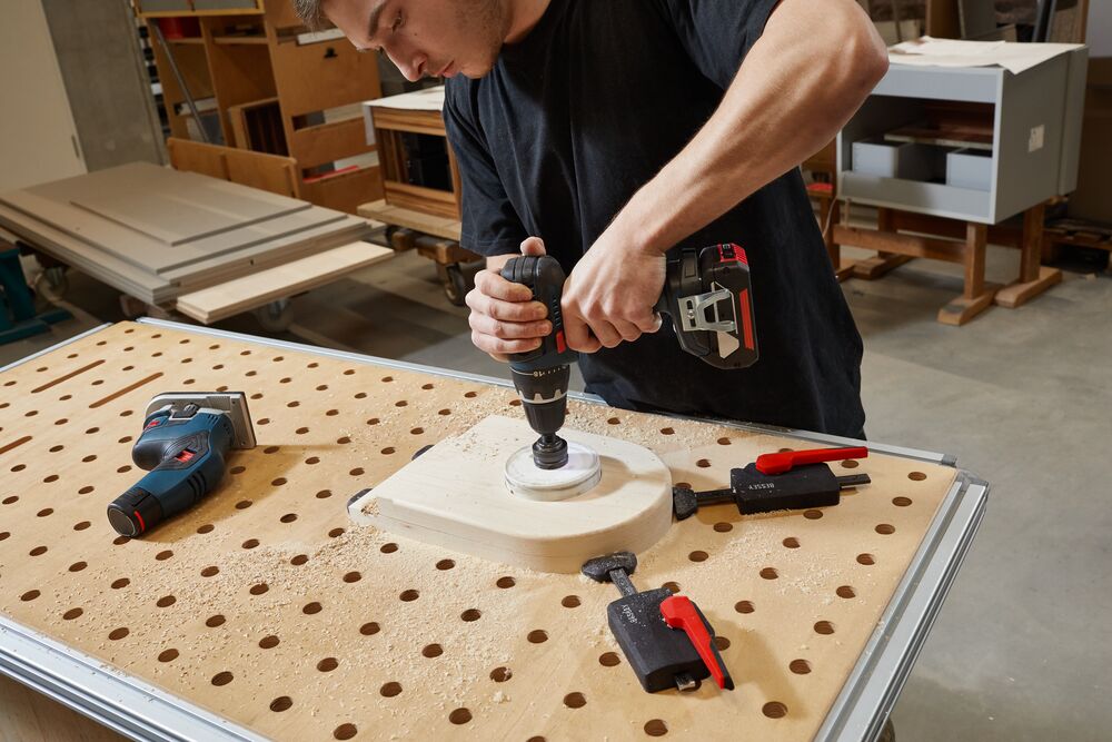 Bessey Horizontal Fixture Clamps Set of Two in action on wooden workbench