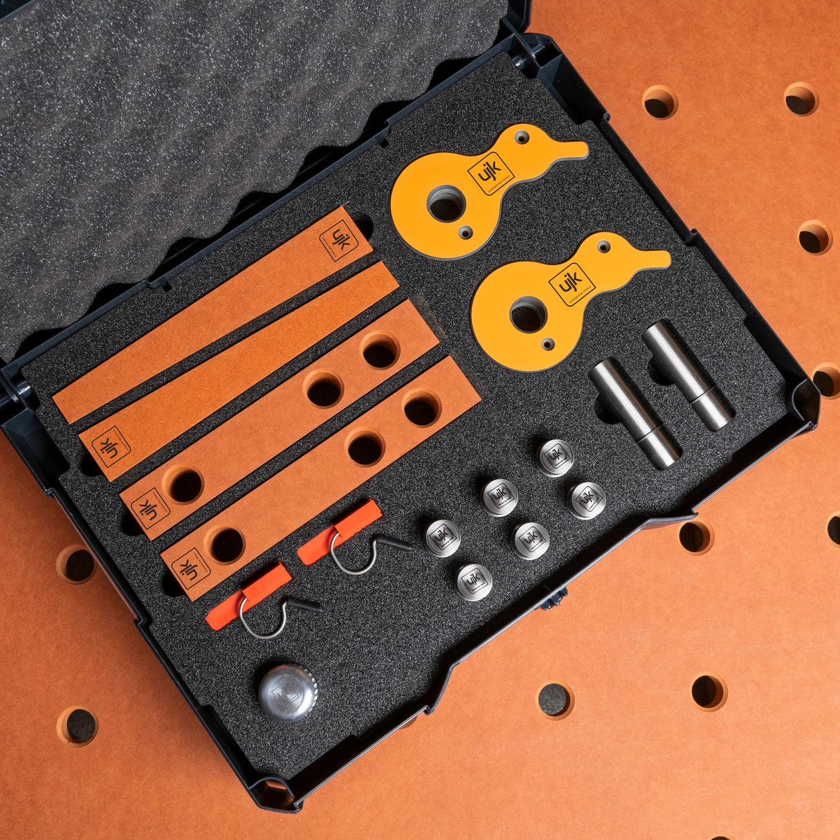 UJK Work Holding Accessory Kit components including Cam Clamps, Wedges, Back Stops, Dog Rail Clips, Guide Pups, and Guide Dogs