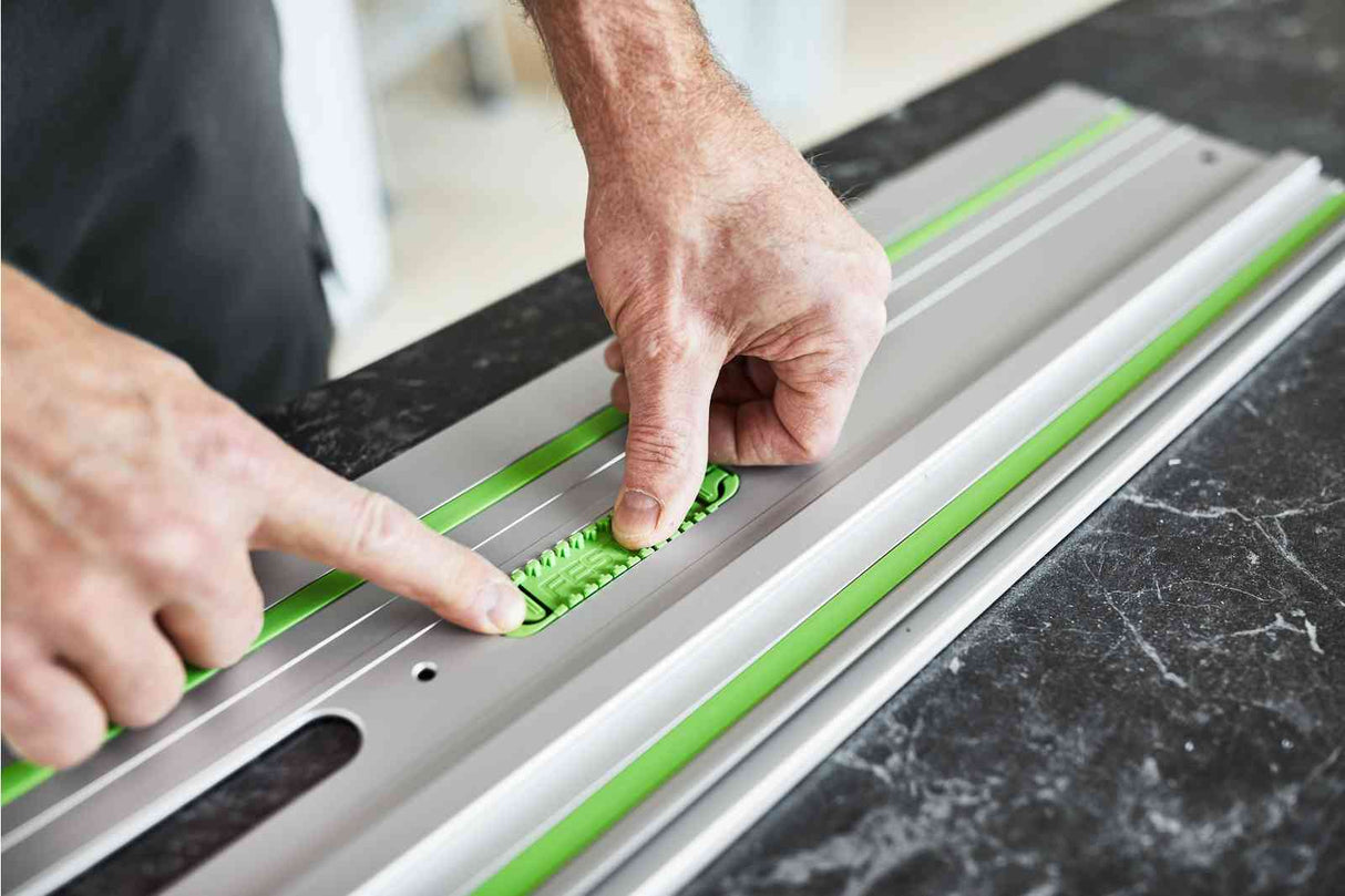 Festool FS Guide Rail Adhesive Pads Pack of 30 in use on a floor for precise cuts and secure attachment