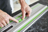 Festool FS Guide Rail Adhesive Pads Pack of 30 in use on a floor for precise cuts and secure attachment
