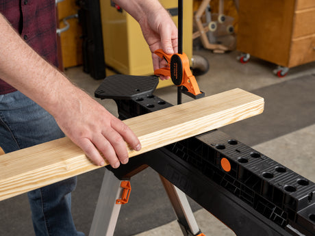 Pony Jorgensen 2-Piece Clamping Sawhorse with clamps and bench dogs in use