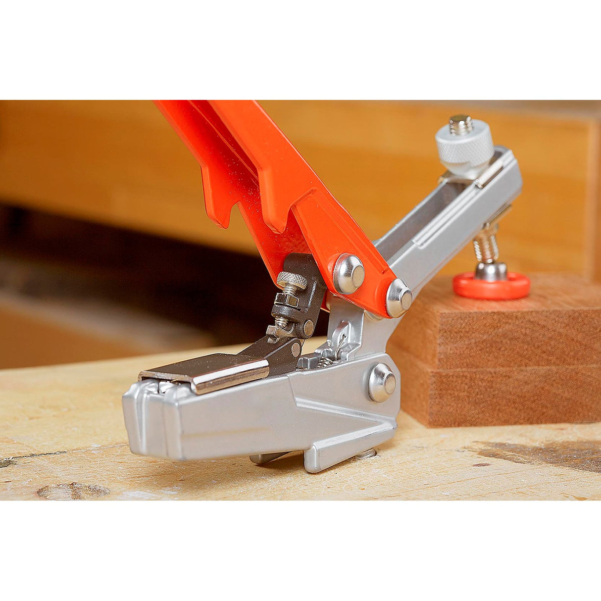 Armor Tool Auto-PRO Bench Dog Hold-Down Clamp in angled view with detailed 19mm serrated hold-down mechanism