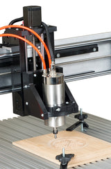 Sherwood water-cooled spindle mounted on router table for precision woodworking