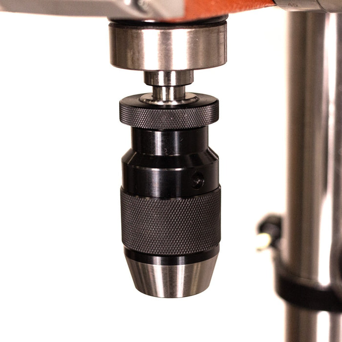 Sherwood Precision Pedestal Drill Press 550W drilling wood and metal at an angle