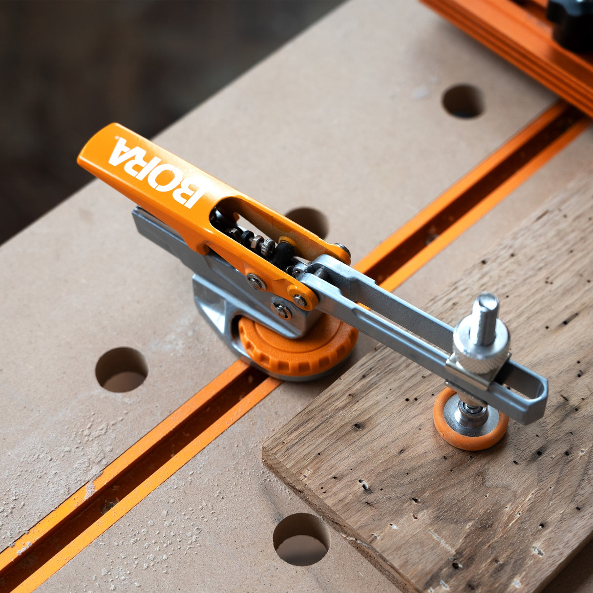 BORA Tool Auto Adjust T-Track Standard Toggle Clamp in use on woodworking project
