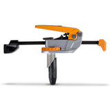 BORA Tool Dog Hole Auto Adjust Toggle Clamp in use on workbench edge