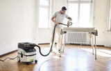 Festool CTM MIDI-I 15L M Class Dust Extractor in use with smooth suction hose and tool storage area