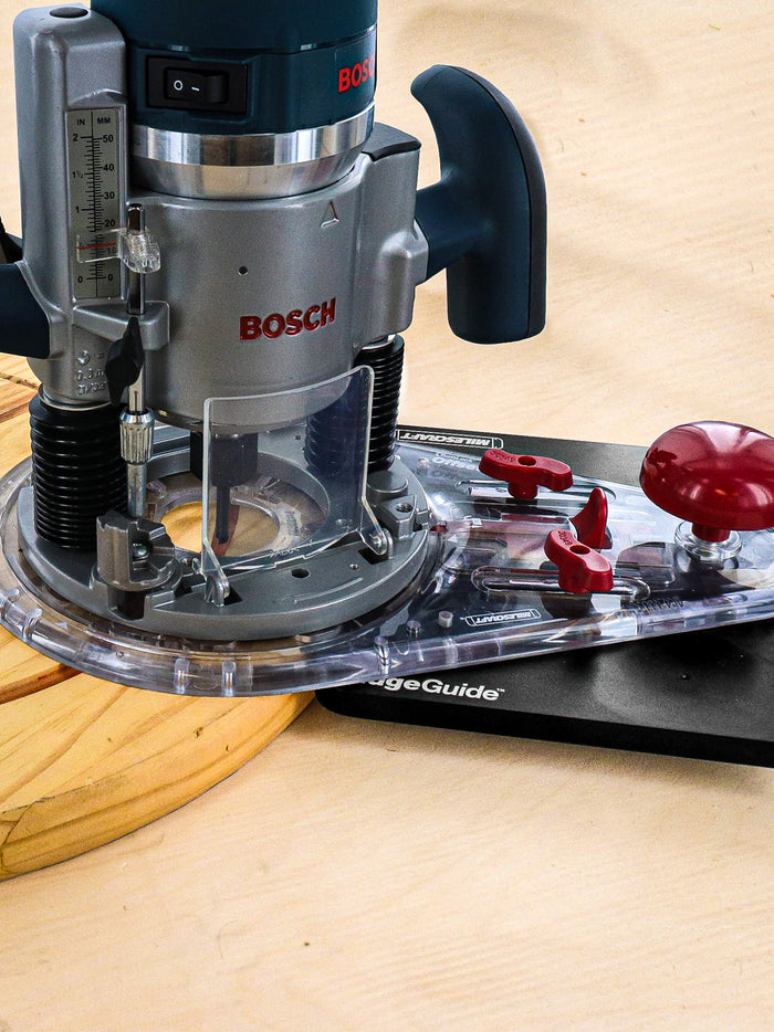 A Bosch router mounted in a Milescraft Edgeguide