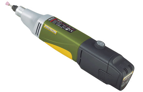 Compact battery-powered rotary tool kit for drilling & grinding, ideal for intricate woodworking projects